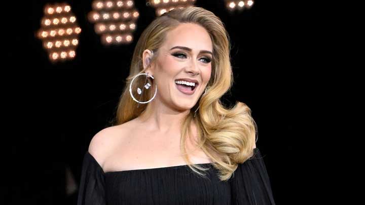 Adele breathes deeply after a show, displaying balanced emotional composure and inner calm.